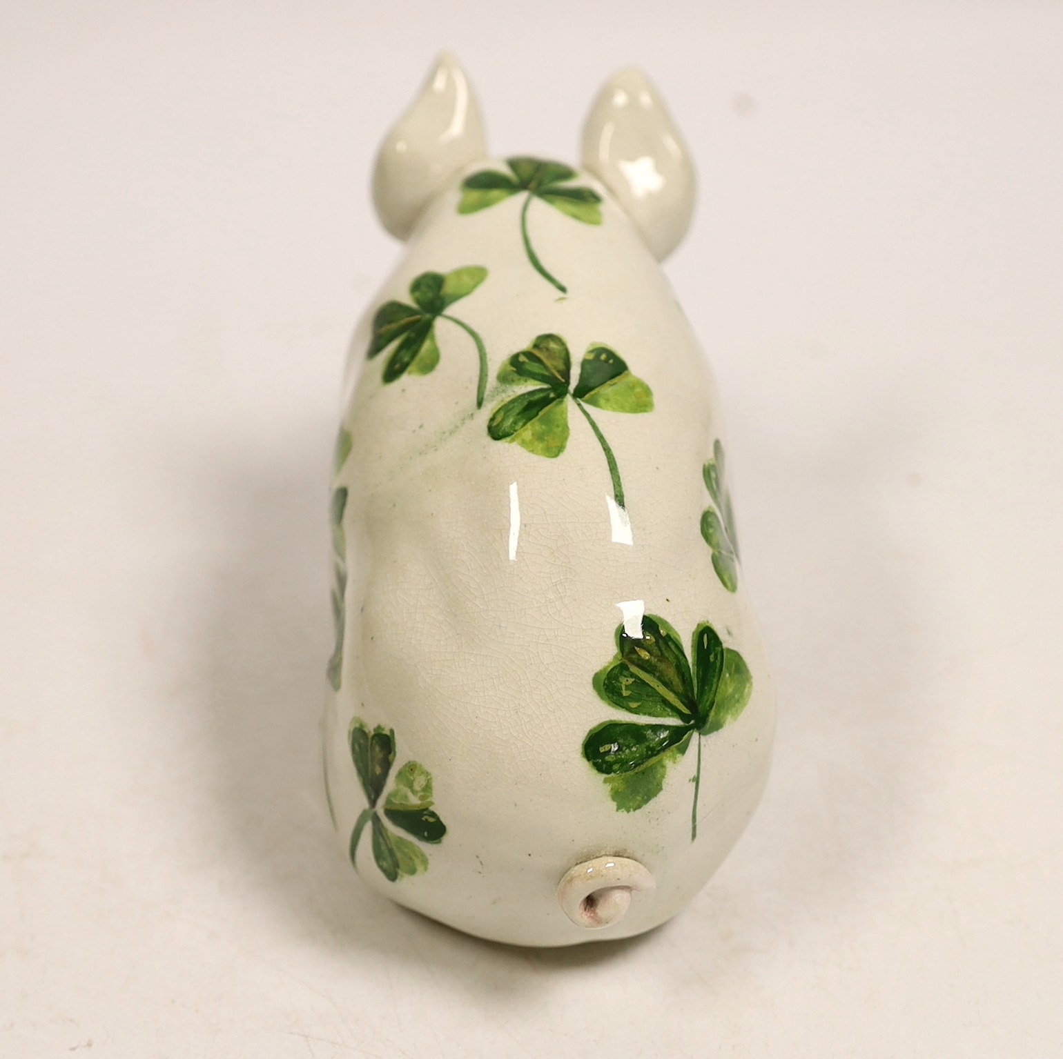 A Wemyss plain green clover pig, 15cm